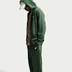 Pants de tejido Fleece con dobladillo abierto para hombre Nike Club