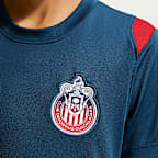 Playera de futbol de manga corta Nike de tejido Knit Dri-FIT para niños talla grande C.D. Guadalajara Academy Pro