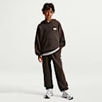 Luźne spodnie dla dużych dzieci (chłopców) Nike Sportswear
