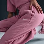 Pants de entrenamiento oversized de tiro alto para mujer Nike Sportswear Phoenix Fleece