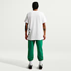 Pants de tejido Fleece cepillado con puños para hombre Nike Club