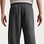 Pantaloni in fleece con orlo aperto Nike Solo Swoosh – Uomo