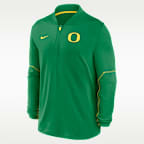 Playera universitaria Nike Dri-FIT de medio cierre para hombre Oregon Sideline