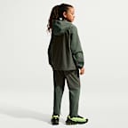 Pantaloni in tessuto Nike Tech – Ragazzo