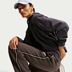Nike Studio Fleece Medium Weight Pantalones de tiro medio con dobladillo abierto - Mujer