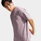 เสื้อยืดขนาดโอเวอร์ไซส์ผู้ชาย N.A.C. Dri-FIT Nike