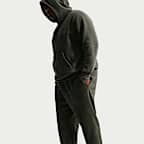 Pants de tejido Fleece con puño con efecto lavado para hombre Nike Sportswear Club