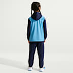 Completo con pantaloni e maglia in tessuto Dri-FIT con zip a tutta lunghezza Nike – Bambino/a