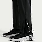 Nike プロ ウィメンズ Dri-FIT ミッドライズ フルレングス ウーブン パンツ