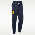 Pants universitarios Nike Dri-FIT entallados para hombre West Virginia Sideline Standard Issue
