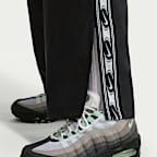 กางเกงขายาวแบบทอเอวปานกลางผู้หญิง Nike Sportswear Classic