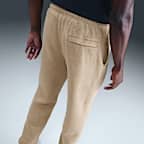 Pants de tejido Fleece con puño con efecto lavado para hombre Nike Sportswear Club