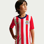 Playera de futbol de manga corta Nike Dri-FIT del C.D. Guadalajara local 2026/27 para niños talla grande