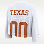 Playera universitaria Nike Dri-FIT cropped para mujer Texas Jersey