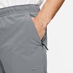 Pantalon avec ouvertures à zip Nike Dri-FIT Unlimited pour homme