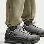 Calças de lã cardada com bainha aberta e bloco de cor Nike Tech para homem