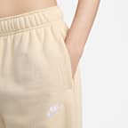 Pants de entrenamiento oversized de tiro medio para mujer Nike Sportswear Club Fleece