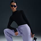 Pants de entrenamiento oversized de tiro alto para mujer Nike Sportswear Phoenix Fleece