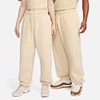 Pants de entrenamiento oversized de tiro medio para mujer Nike Sportswear Club Fleece