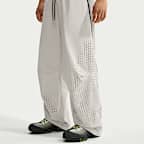 Pantaloni in maglia con orlo aperto Dri-FIT Shori Nike Tech – Uomo
