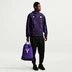 FC Barcelona 25/26 Away Nike Academy-gymnastikpose