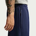 Nike Solo Swoosh Pantalón de tejido Fleece con dobladillo abierto - Hombre