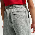 Pants holgados con dobladillo abierto para niños Nike Sportswear