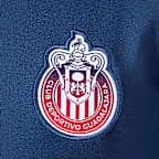 Playera de futbol de manga corta Nike de tejido Knit Dri-FIT para niños talla grande C.D. Guadalajara Academy Pro