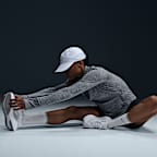 Playera de correr Dri-FIT UV de cierre de 1/4 para mujer Nike Swift