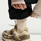 Pantalon en maille taille haute Therma-FIT Nike MAVN pour fille