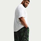 Pants cargo de tejido Woven con estampado integral para hombre Nike Air