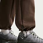 Pantalones de tejido Fleece con dobladillo abierto y colores contrastantes Nike Tech para hombre