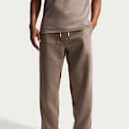 Pants de básquetbol Therma-FIT cepillados con dobladillo abierto para hombre Nike Standard Issue
