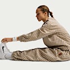 Pants de tenis de tiro medio holgados para mujer NikeCourt Court Collection