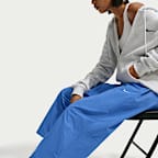 Pants de tejido Woven de tiro alto oversized para mujer Nike Sportswear