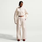 Pantalones de tiro medio holgados para mujer Nike Pregame Fleece