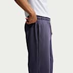 Pants de básquetbol Therma-FIT cepillados con dobladillo abierto para hombre Nike Standard Issue