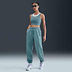 Pants de entrenamiento oversized de tiro alto para mujer Nike Sportswear Phoenix Fleece