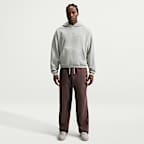 Pants de básquetbol Therma-FIT cepillados con dobladillo abierto para hombre Nike Standard Issue