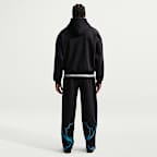 Calças de basquetebol escovadas Nike Standard Issue para homem