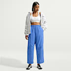 Pants de tejido Woven de tiro alto oversized para mujer Nike Sportswear