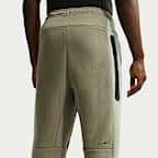 Calças de lã cardada com bainha aberta e bloco de cor Nike Tech para homem