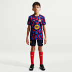FC Barcelona Older Kids' Nike Dri-FIT Football Pre-Match Top