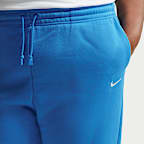 Pants de entrenamiento oversized de cintura alta para mujer (talla grande) Nike Sportswear Phoenix Fleece