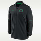 Playera universitaria Nike Dri-FIT de medio cierre para hombre Oregon Sideline