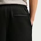 Pantaloni in fleece con orlo aperto Nike Club – Uomo