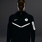 Chelsea F.C. Tech Men's Nike Fleece Windrunner Football Jacket with Reflective Design Accents