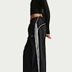 Pants deportivos de tiro alto holgados para mujer Nike Sportswear
