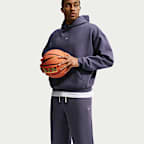Pants de básquetbol Therma-FIT cepillados con dobladillo abierto para hombre Nike Standard Issue