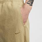 Nike Club 男款梭織窄管長褲